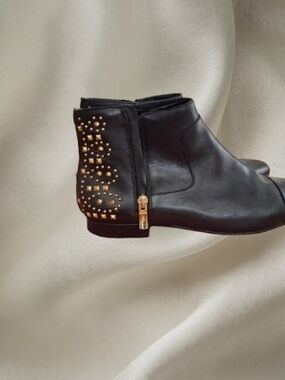 BCBGeneration Black Leather Ankle Boots with Gold Studs